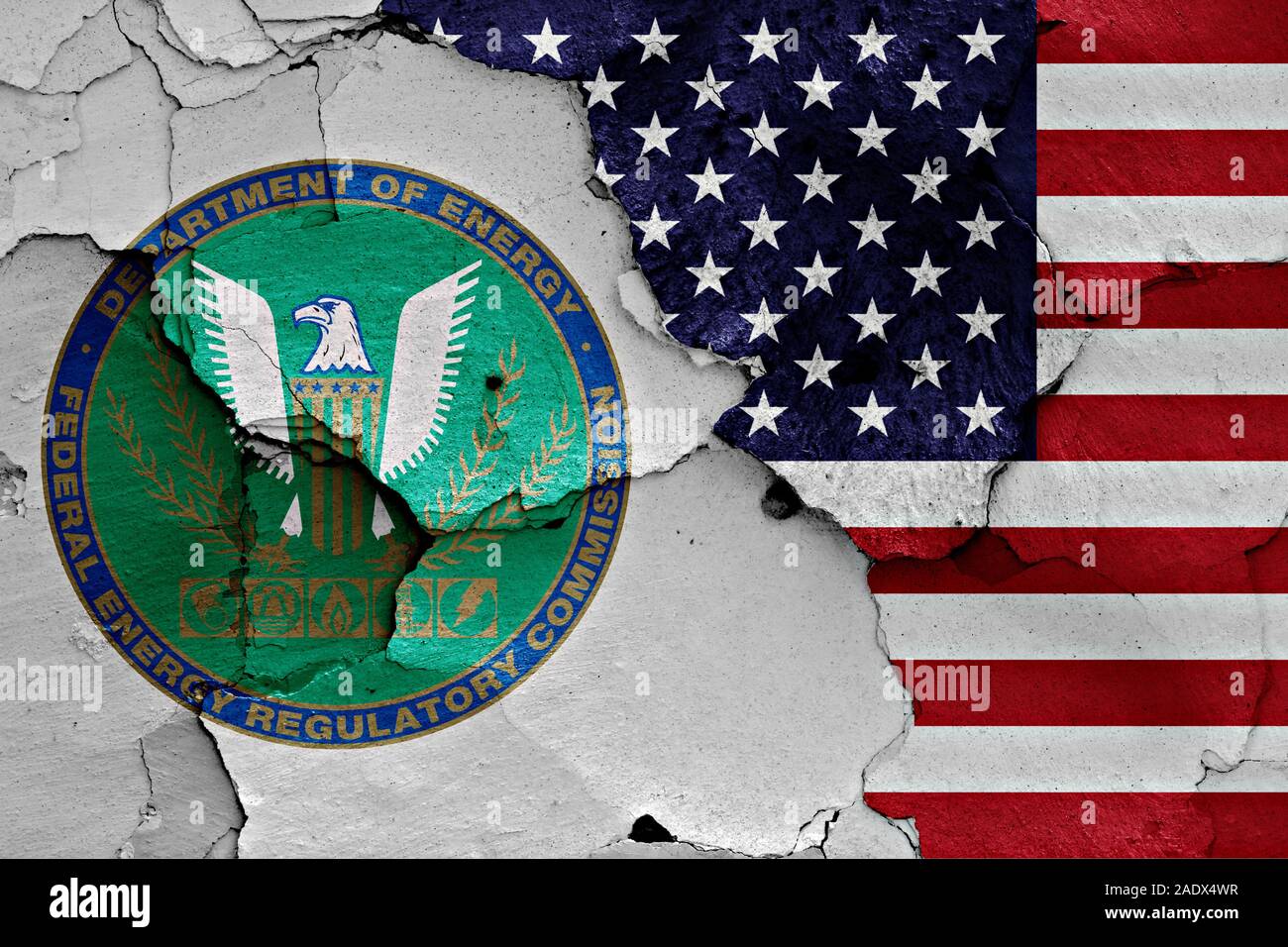 flags of Federal Energy Regulatory Commission and USA painted on cracked wall Stock Photo