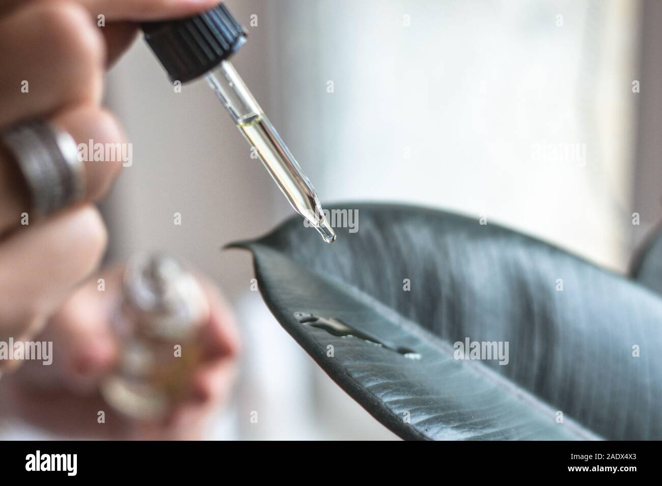 A drop of organic oil. Cosmetology health care Stock Photo