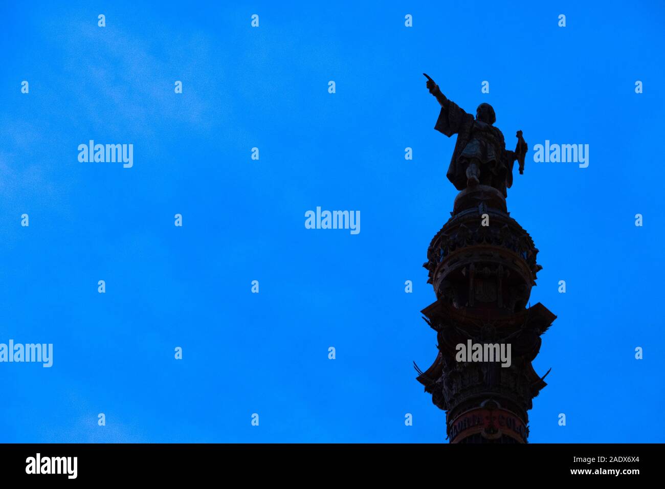 Columbus Monument statue of Christopher Columbus (Mirador de Colom) at the Plaça de la Porta de Pau in Barcelona, Spain, Europe Stock Photo