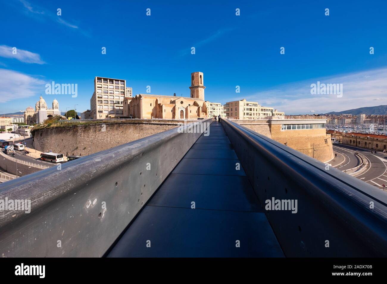 Passerelle Parvis-St Jean footbridge towards the Saint-Laurent de Marseille catholic church in Marseille, France Stock Photo