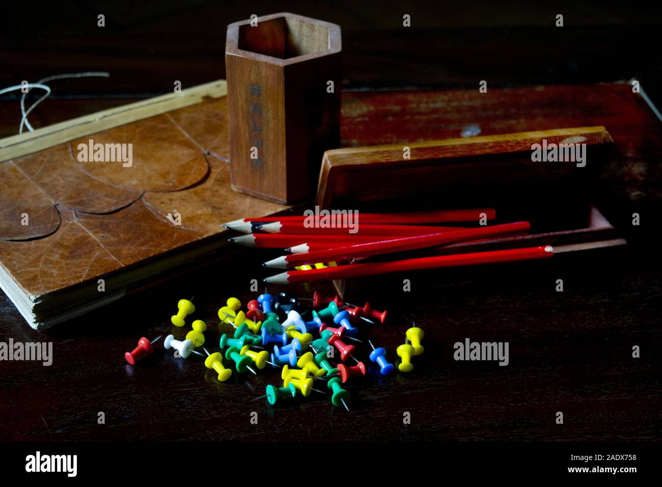 pencils and others stationery objecs on a desk Stock Photo