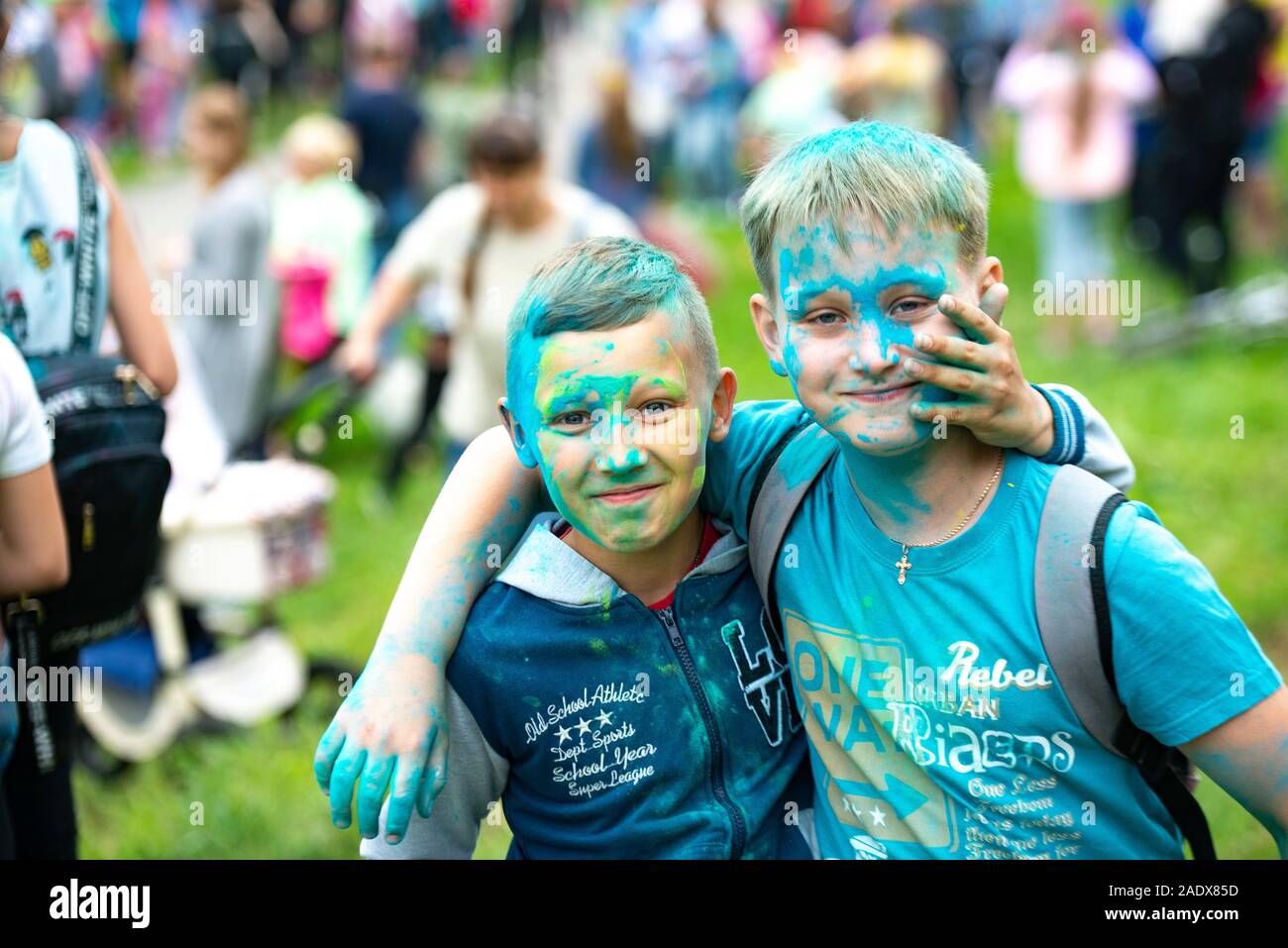 Chelyabinsk Region, Russia - JULY 2019. Festival of colors for children. Two boys of different races are friends at the festival of colors. Stock Photo
