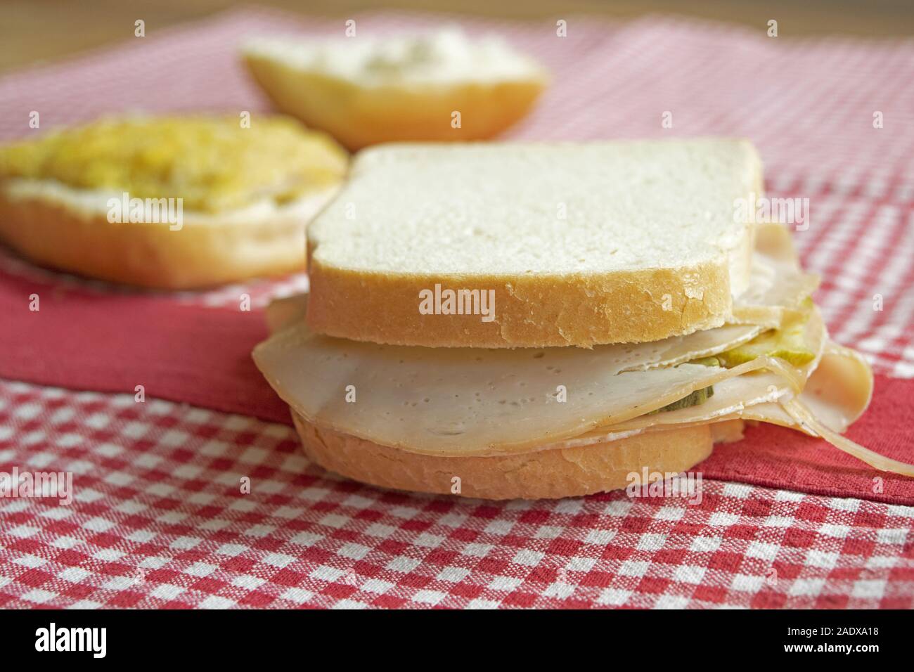 light sandwich filled with green sald and cold cuts turkey Stock Photo