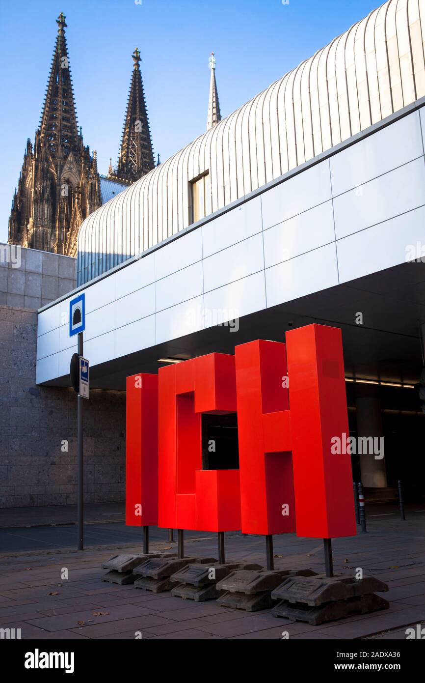 red letters symbolize the word ICH ( I ), Kurt-Hackenberg square, the Museum Ludwig, the cathedral, Cologne, Germany.  rote Buchstaben stellen das Wor Stock Photo
