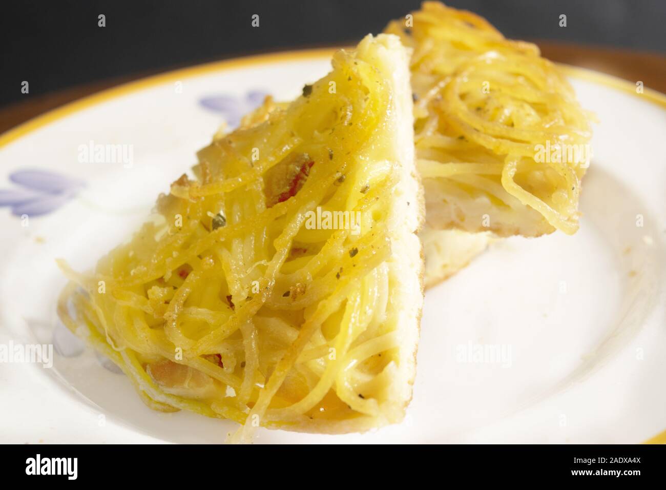 wedge of homemade omelette pasta in a dish Stock Photo