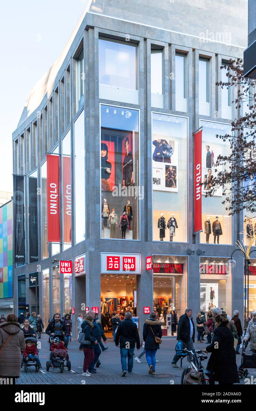 Uniqlo department store at the shopping street Hohe Strasse, Cologne, Germany.  Uniqlo store in der Fussgaengerzone Hohe Strasse, Koeln, Deutschland. Stock Photo