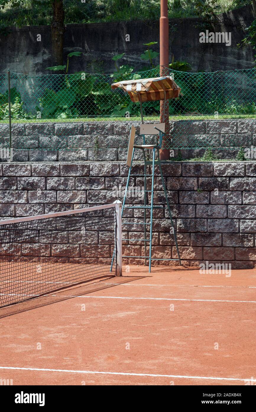 red clay tennis court in a mountain resort area Stock Photo Alamy