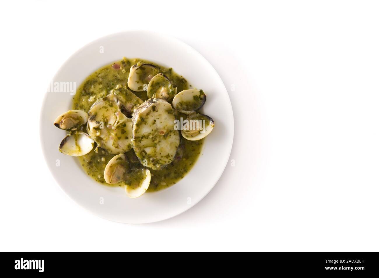 Hake fish and clams with green sauce and copy space. Typical spanish