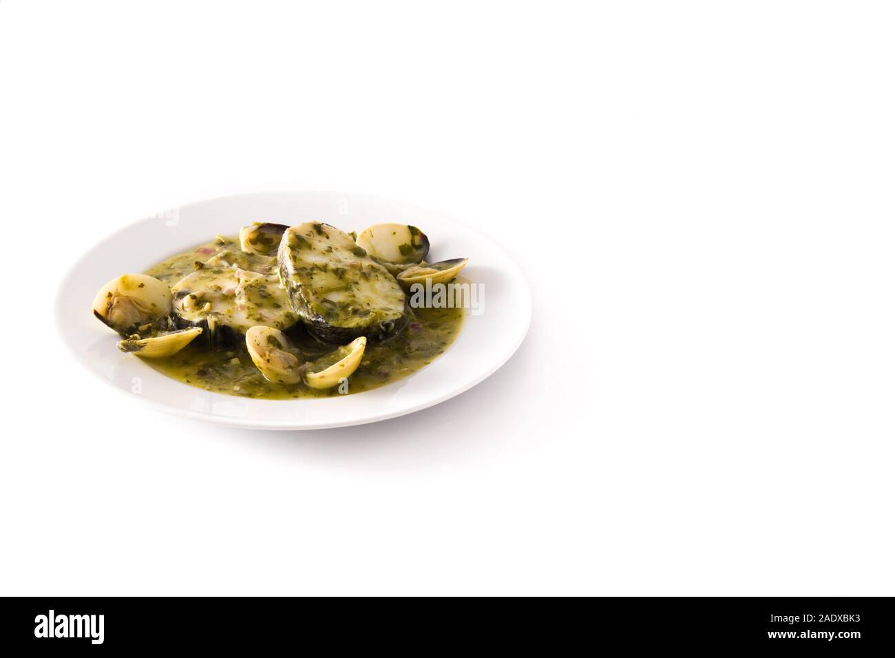 Hake fish and clams with green sauce and copy space. Typical spanish