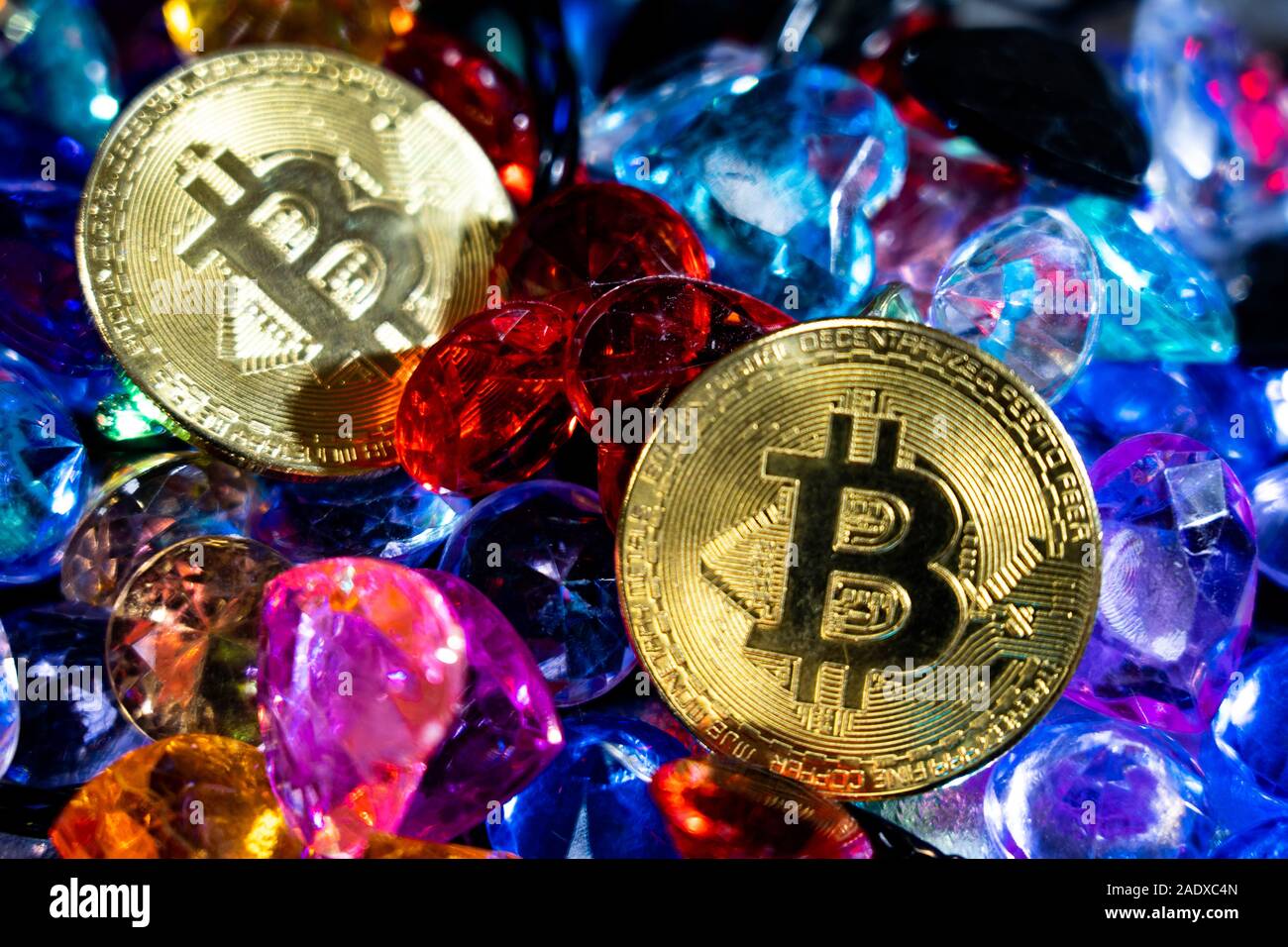 Bitcoin Gold coins strewn with various stones. Golden bitcoin  cryptocurrency mining concept Stock Photo - Alamy