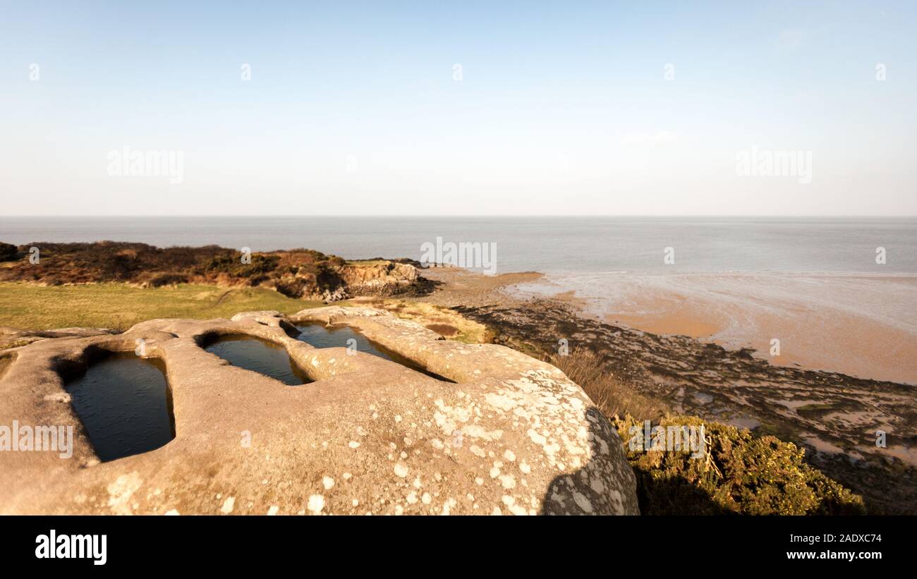 Ancient carved stone graves, Heysham. Overlooking Morecambe Bay, North West England, the graves are believed to date back to Saxon or Viking times. Stock Photo