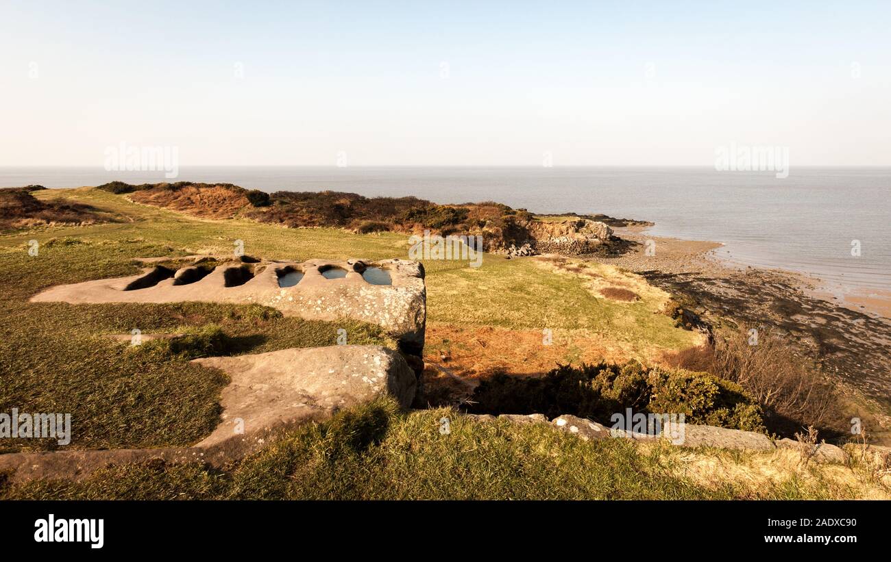 Ancient carved stone graves, Heysham. Overlooking Morecambe Bay, North West England, the graves are believed to date back to Saxon or Viking times. Stock Photo