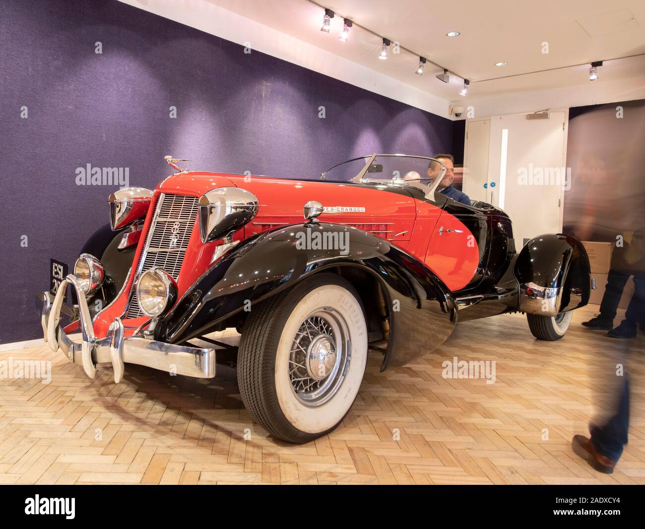 Bonhams, London, UK. 5th December 2019. Bonhams Bond Street Fine Collectors’ Motor Car sale preview includes cars owned by Jay Kay, Barbara Hutton, HRH The Prince of Wales, Jools Holland. The sale takes place on 7th December. Image: Ex-Barbara Hutton 1935 Auburn 851 Supercharged Boattail Speedster is manoeuvred into Bonhams. First owned by the ‘poor little rich girl’ Woolworth heiress and 1930s socialite, who bought it for her first husband, Prince Alexis Mdivani. Estimate £650,000–750,000. Credit: Malcolm Park/Alamy Live News. Stock Photo