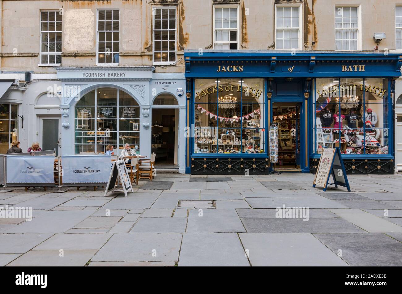 Two traditional English shop windows, Jacks Bath, luxury tourist gift shop  and Cornish Bakery, Bath city centre, Somerset , England, UK. Stock Photo