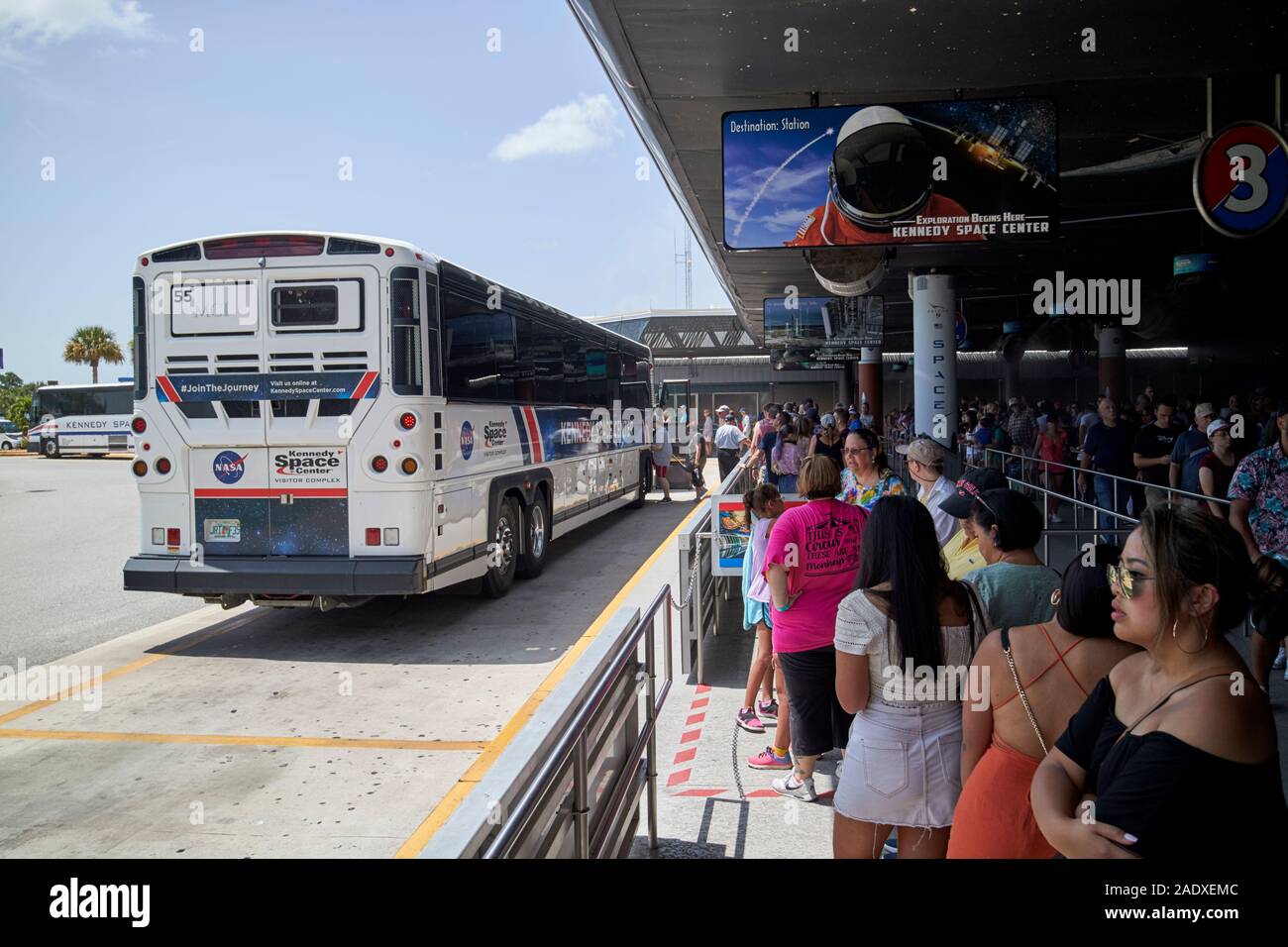 tourists queuing on a hot summer day for the nasa tour busses kennedy space center florida usa Stock Photo