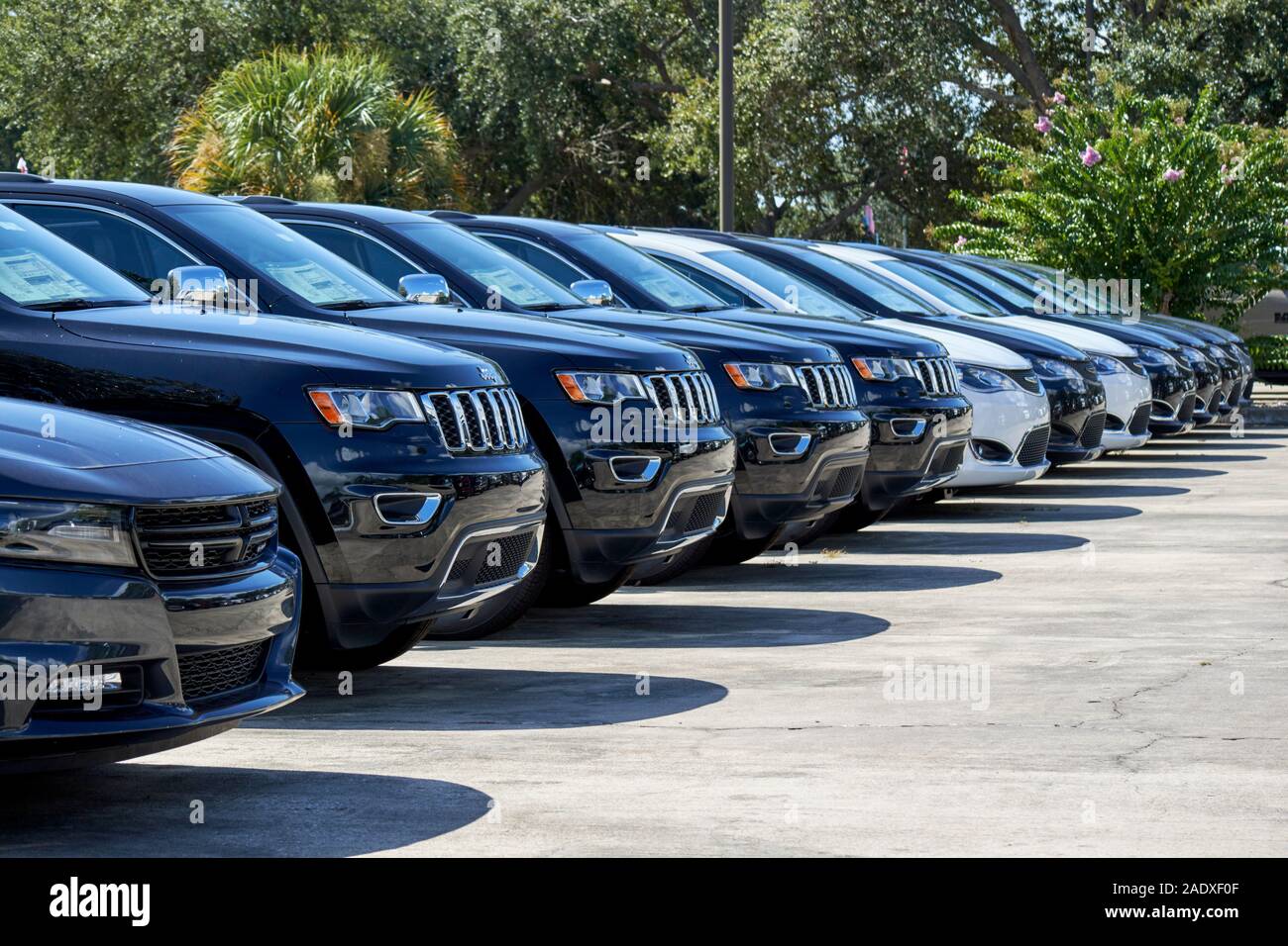 jeep suv and cars new vehicles for sale at a car dealers in florida usa Stock Photo