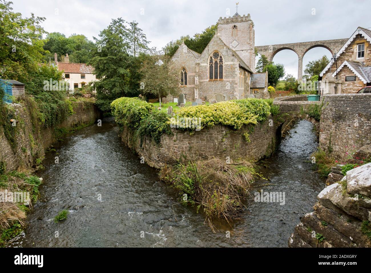 Pensford, historic village in Somerset, St Thomas à Becket Church, Pensford Viaduct behind, Publow, England, Uk. Stock Photo