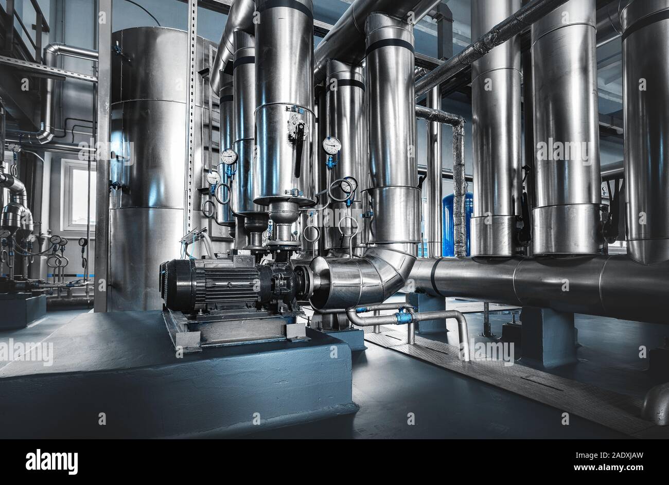 pipe line with steam supply pumps and pressure gauges installed in the