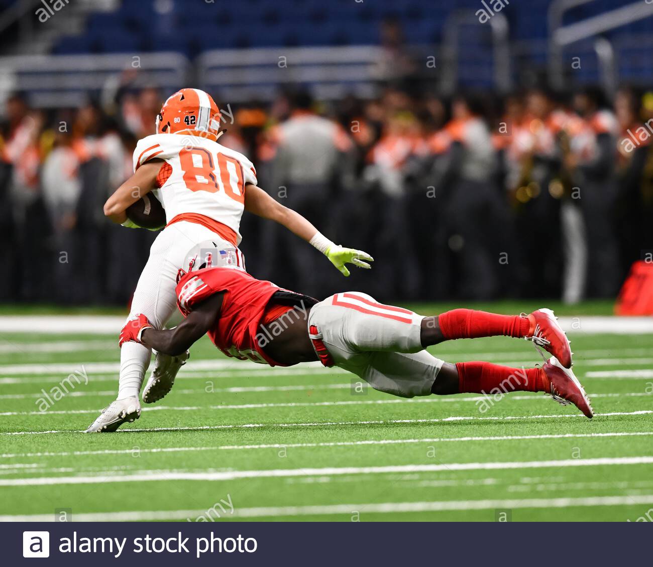 Action Photos Of High School Football Players Making Amazing Plays During A Football Game Stock Photo Alamy