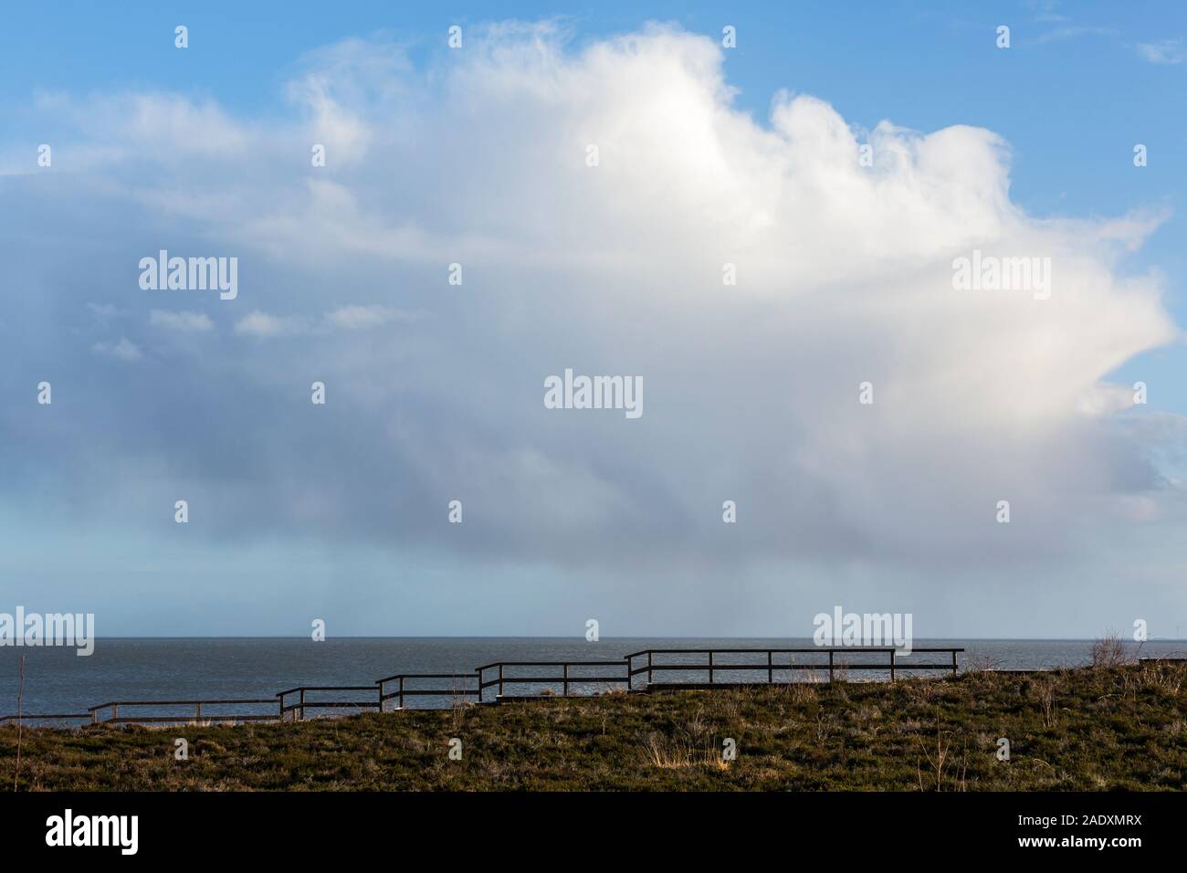 Sylt, Braderuper Heide, Duenenweg, Wattenmeer, Regenwolken Stock Photo