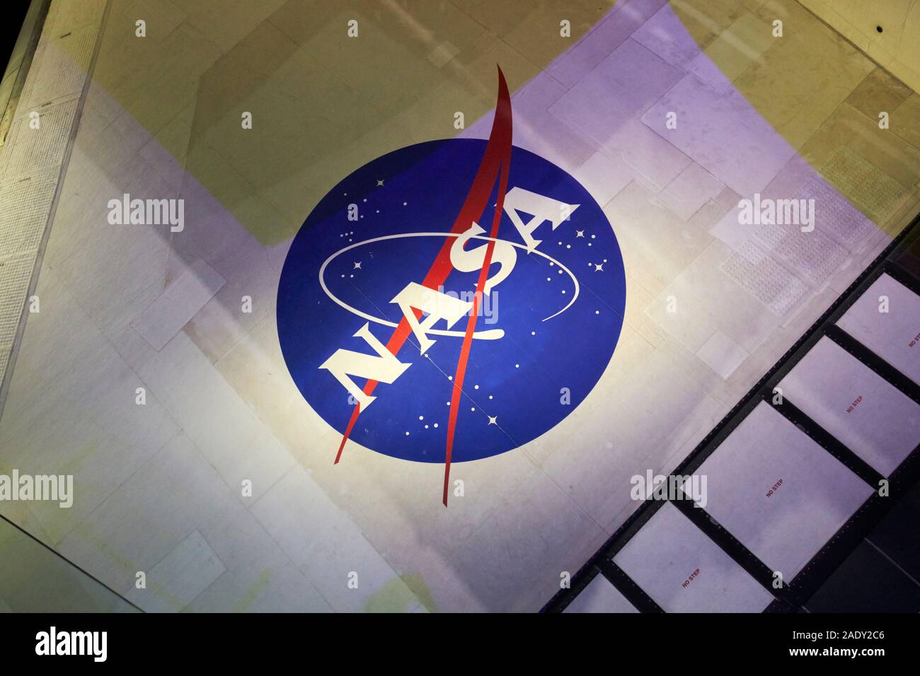 nasa logo on the wing of the space shuttle atlantis on display in the kennedy space center florida usa Stock Photo