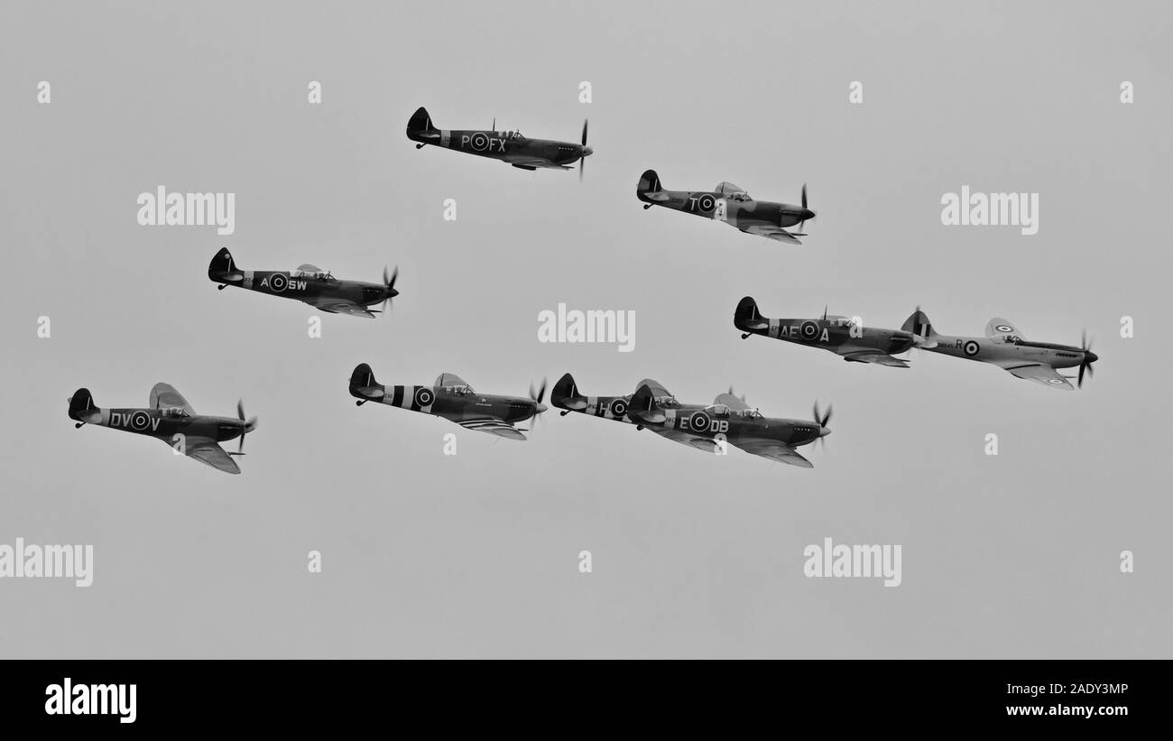 Mass Spitfire formation airborne at the Battle of Britain airshow at the IWM Duxford on the 22 September 2019 Stock Photo