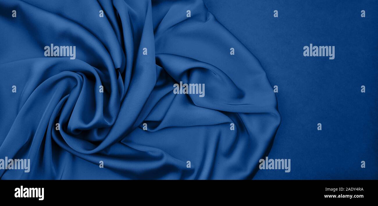 Knitted silk wool texture blue color. full frame background . close up. copy space. Stock Photo