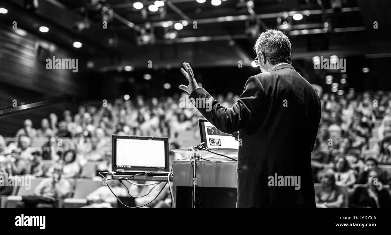 Giving speech at podium Black and White Stock Photos & Images - Alamy