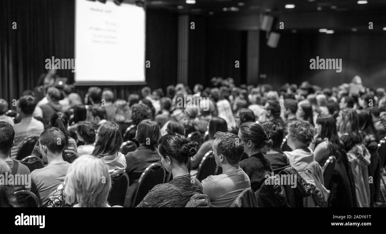 Audience in the lecture hall attending scientific business conference ...