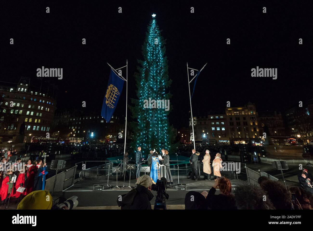 London, UK.  5 December 2019.  The annual lighting of the Christmas Tree takes place in Trafalgar Square.  The tree, a Norwegian spruce, is donated by the City of Oslo to the people of London each year as a token of gratitude for Britain’s support during the Second World War.  This year, the tree has been criticised for having branches which look too sparse. Credit: Stephen Chung / Alamy Live News Stock Photo
