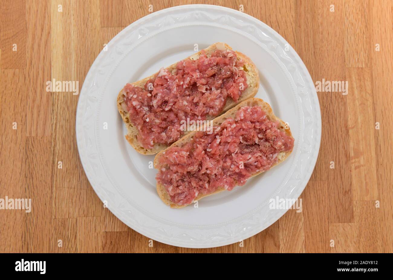 Teller mit Mettbrötchen, Fleischkonsum Stock Photo