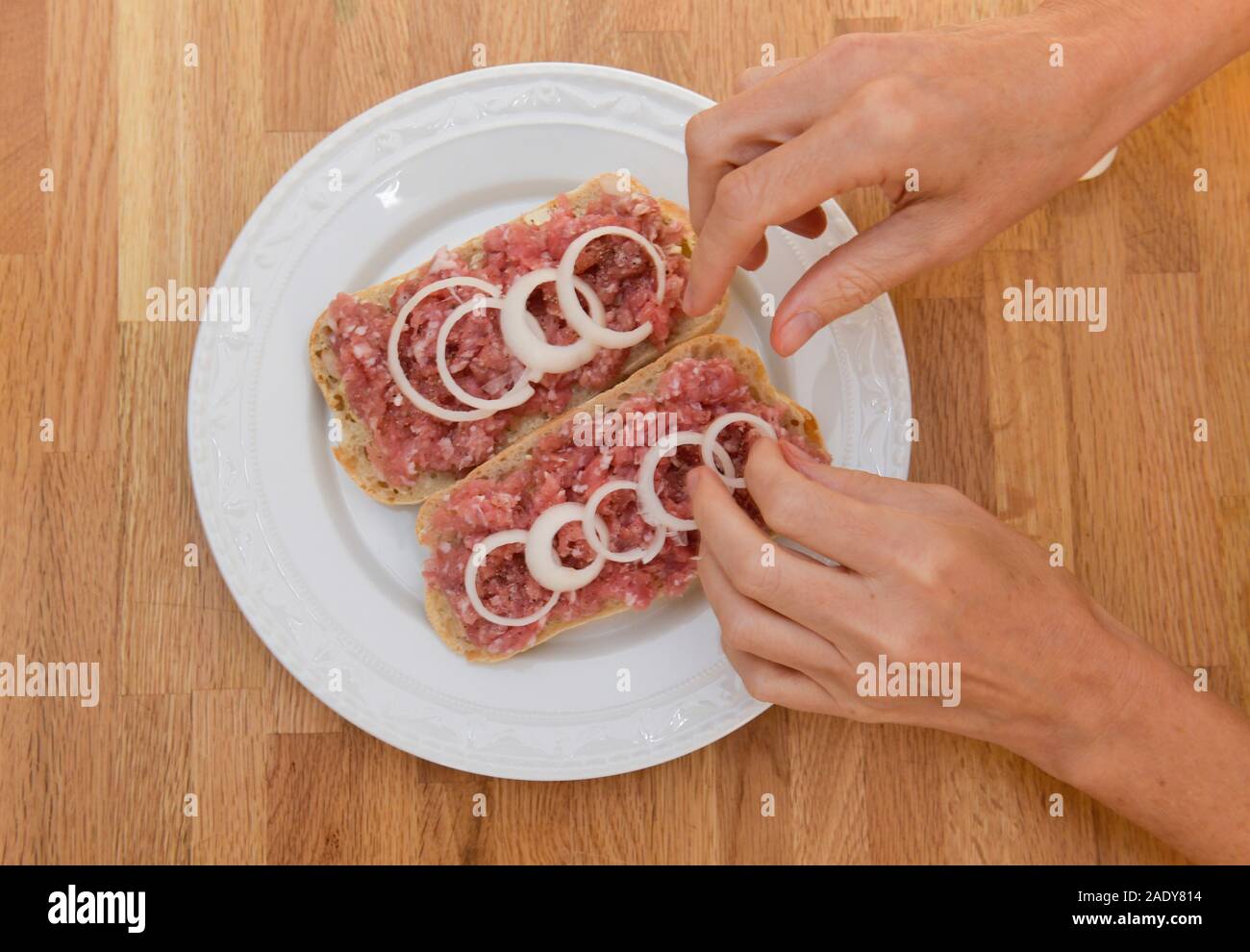 Teller mit Mettbrötchen, Fleischkonsum Stock Photo