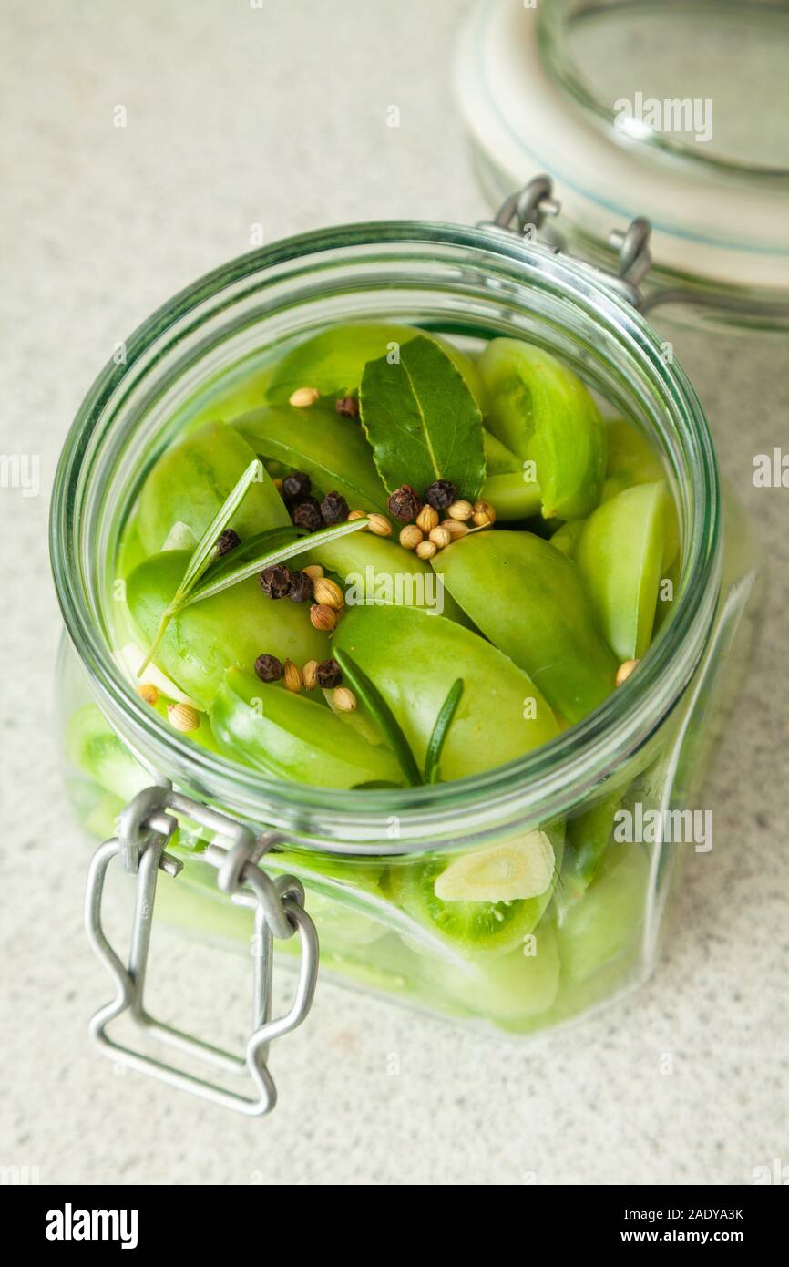 Homemade Pickled tomatoes in a glass jar Stock Photo Alamy
