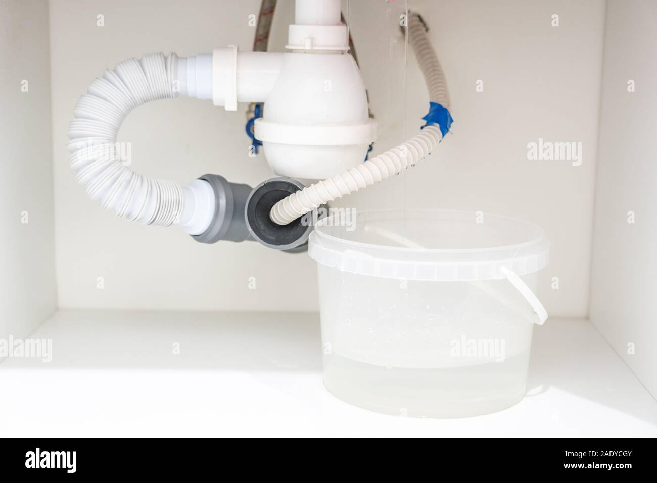 Leakage Of Water From plastic Pipe under sink Stock Photo Alamy