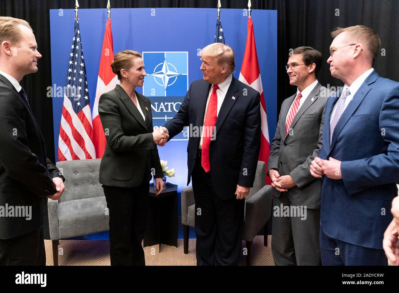U.S. President Donald Trump shakes hands with Danish Prime Minister Mette Frederiksen prior to a bilateral meeting on the sidelines of the NATO Summit December 4, 2019 in Watford, Hertfordshire, United Kingdom. Stock Photo