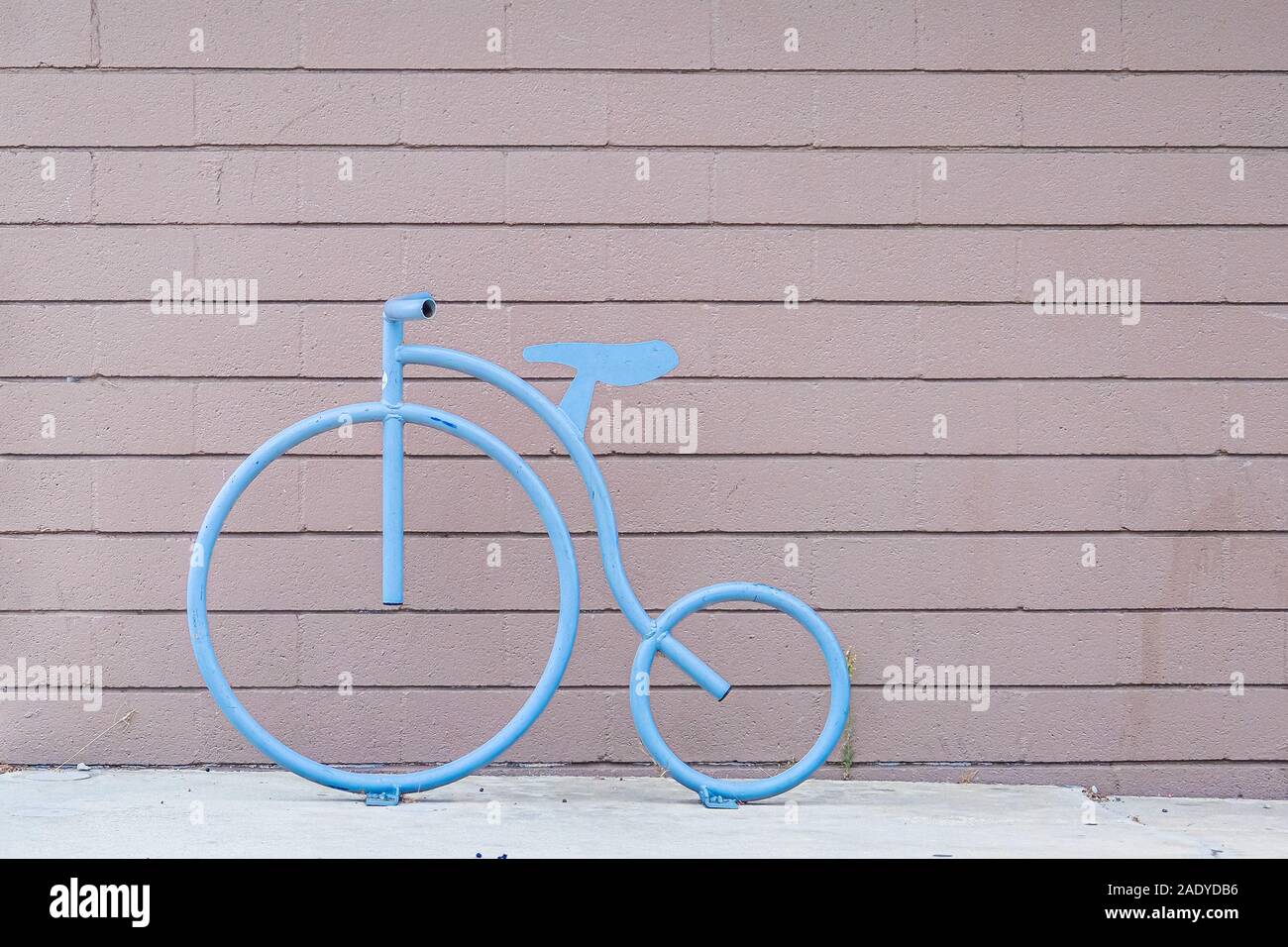 Blue Bicycle Design on Plank Wall Stock Photo
