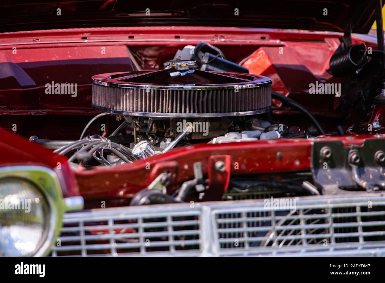 Car Under Hood Close Up, View Of A Red Engine With Big Black Round Air  Intake Filter, Tubes, Wires, Pipes, Mechanical And Electrical Other Parts  Stock Photo, Picture and Royalty Free Image.