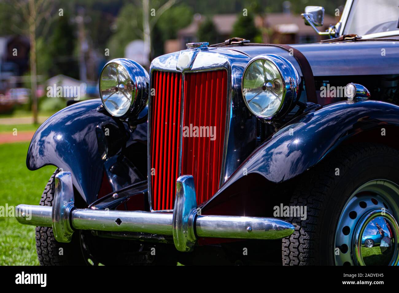 Old Classic Antique Black Car Front Details With Red Grille And Chrome Body Parts And Big Headlamp Lights And Small Lamps Outdoor Background Stock Photo Alamy