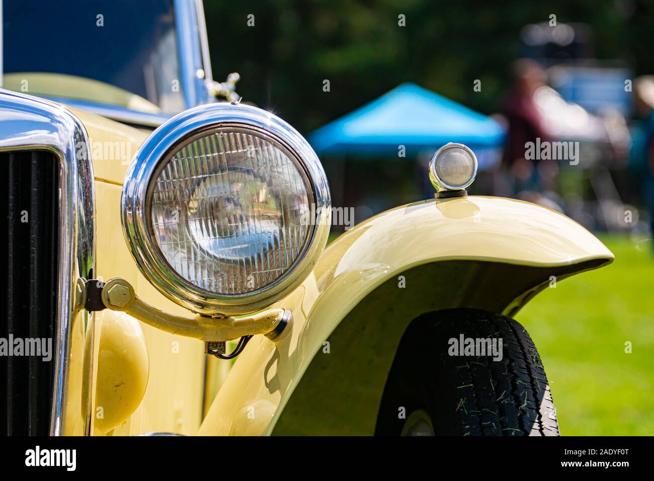 Old Classic Antique Car Half Front Details With Cream White Color With Chrome Body Parts Outdoor Close Up On One Of The Big Headlamp Lights Stock Photo Alamy