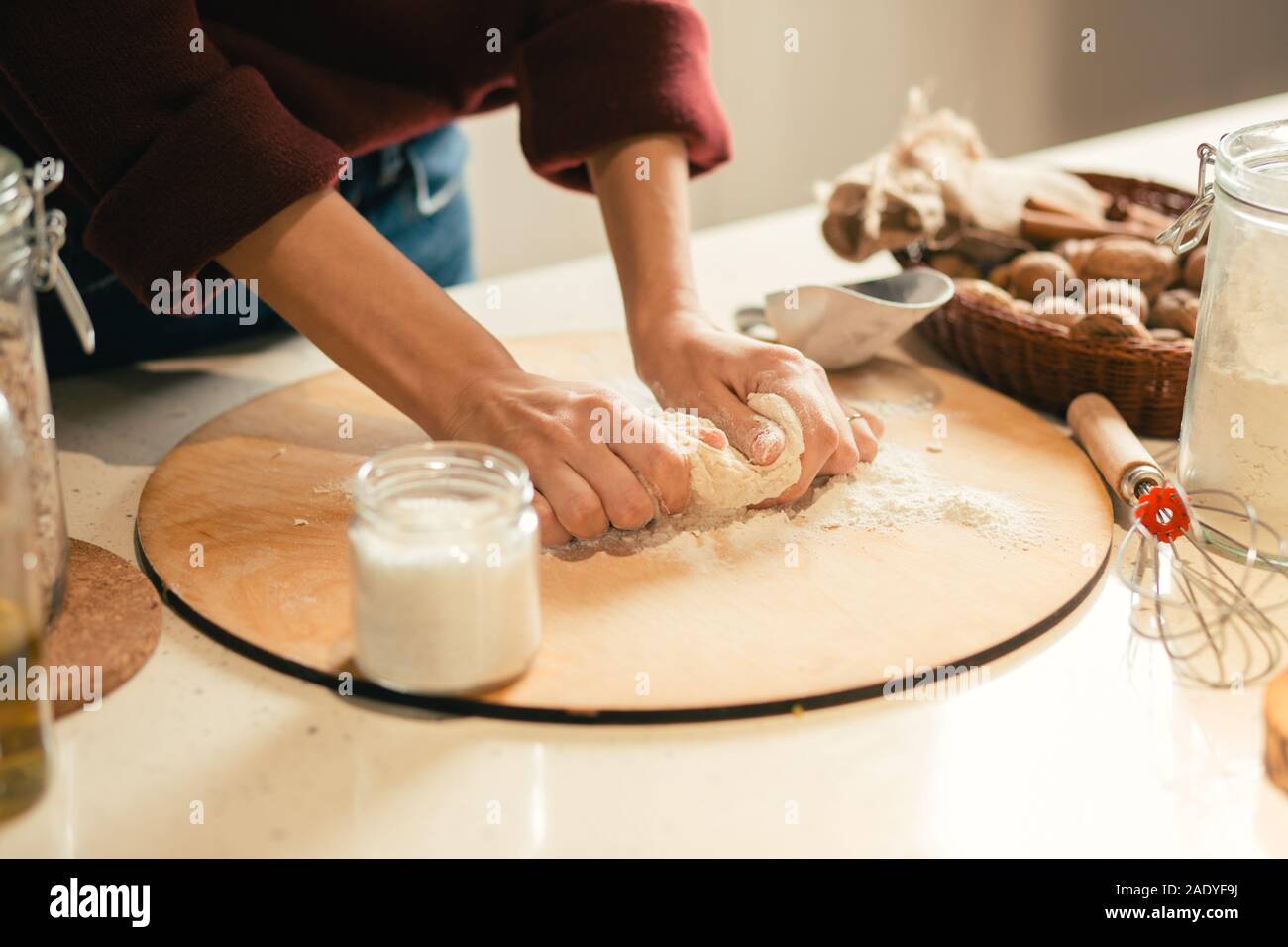 Close up of woman hands kneading dough in the kitchen Stock Photo - Alamy