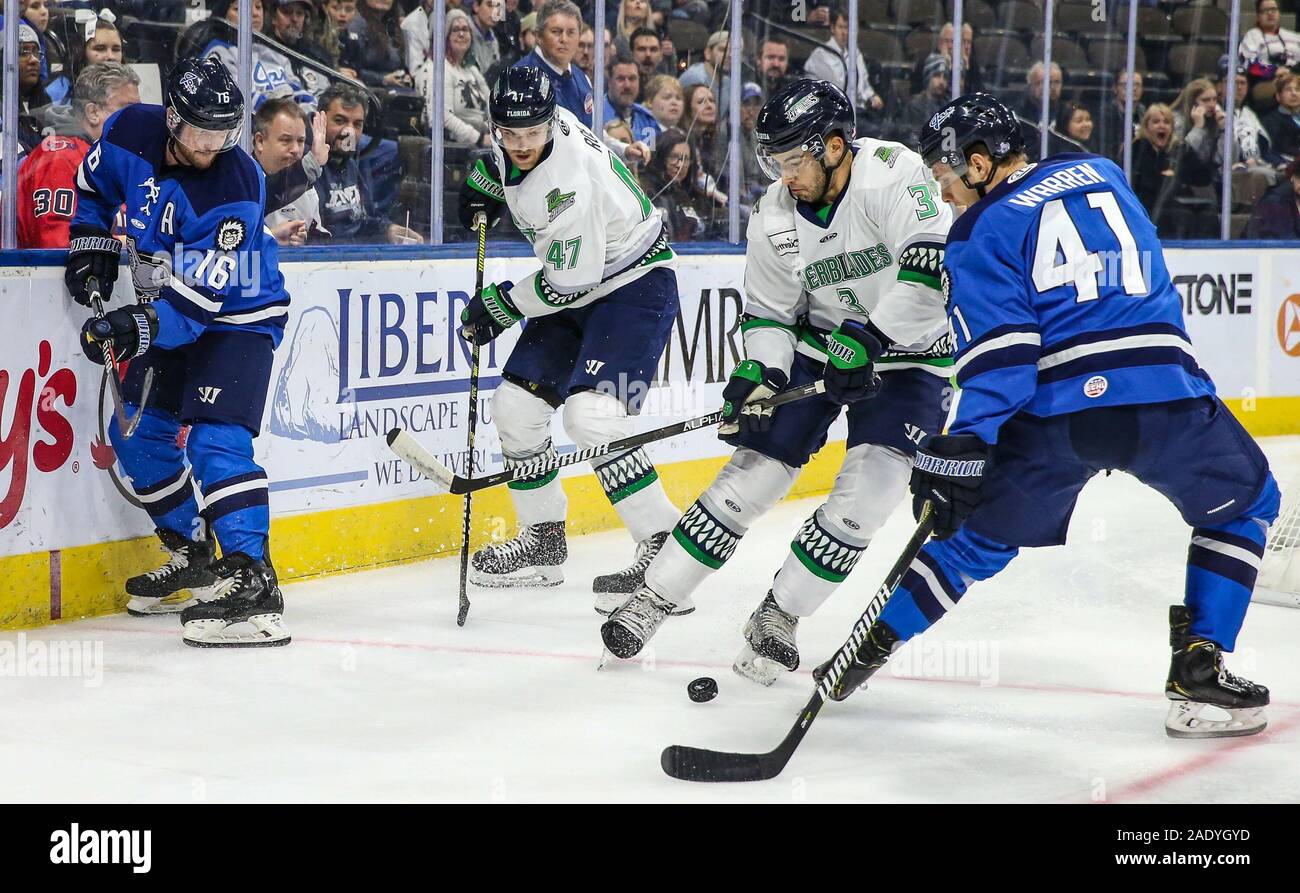 Jacksonville Icemen forward John Albert (16), left, and forward Brendan