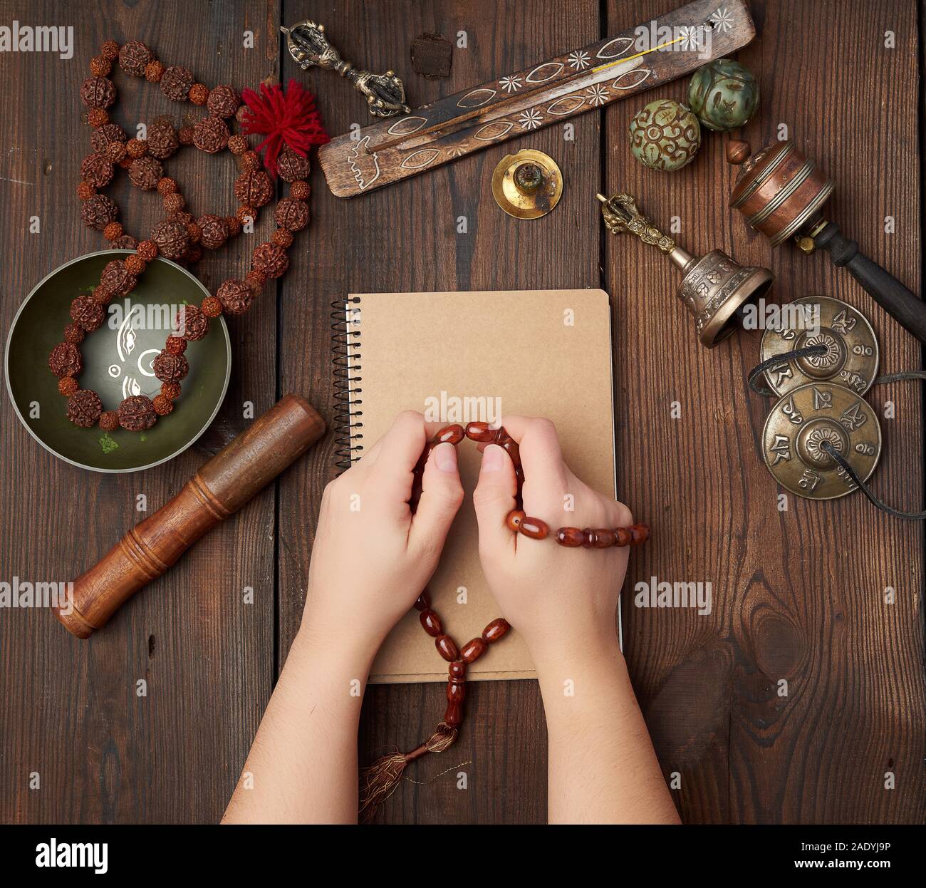 Old woman hand prayer beads hi-res stock photography and images - Alamy