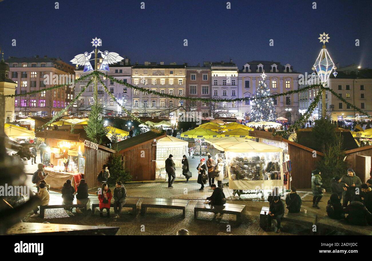 Krakow, Poland. 5th Dec, 2019. Christmas tree seen on the Main Square.  Christmas illuminations appeared in Krakow and the Christmas market began  as thousands of lights shine every night on the main