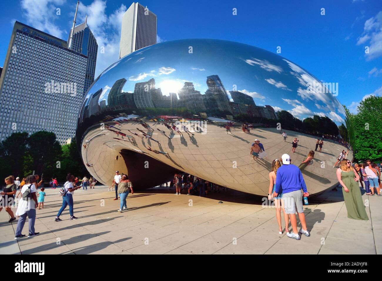 Chicago, Illinois, USA. Tourists congregate around Cloud Gate (also