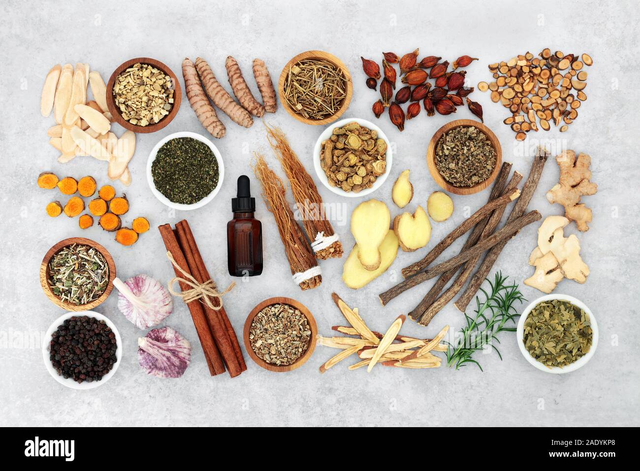 Herb and spice collection used in natural and chinese herbal medicine to treat asthma and respiratory disease with aromatherapy essential oil. Stock Photo