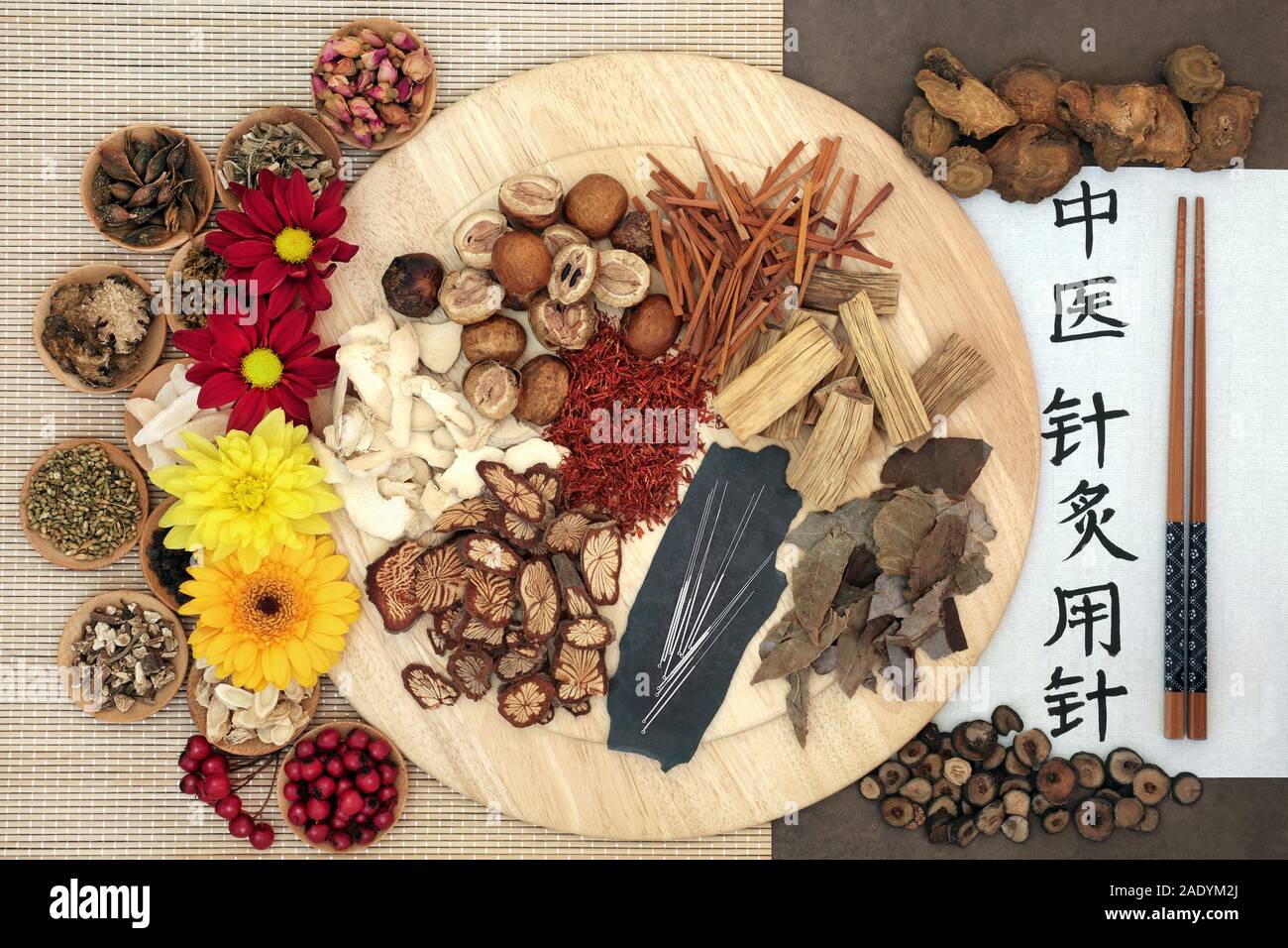 Chinese herb selection and acupuncture needles with calligraphy script