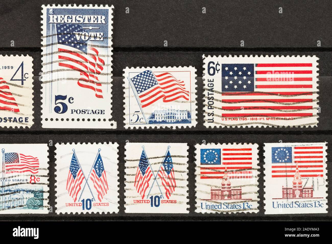 SEATTLE WASHINGTON - November 28, 2019:  Rows of old used United States postage stamps in stock album. Stock Photo