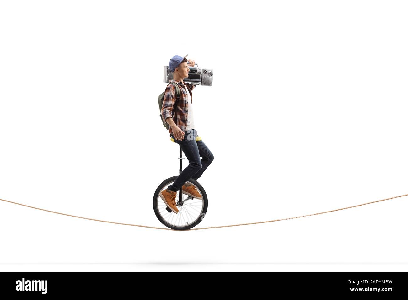 Boy on unicycle Cut Out Stock Images & Pictures Alamy