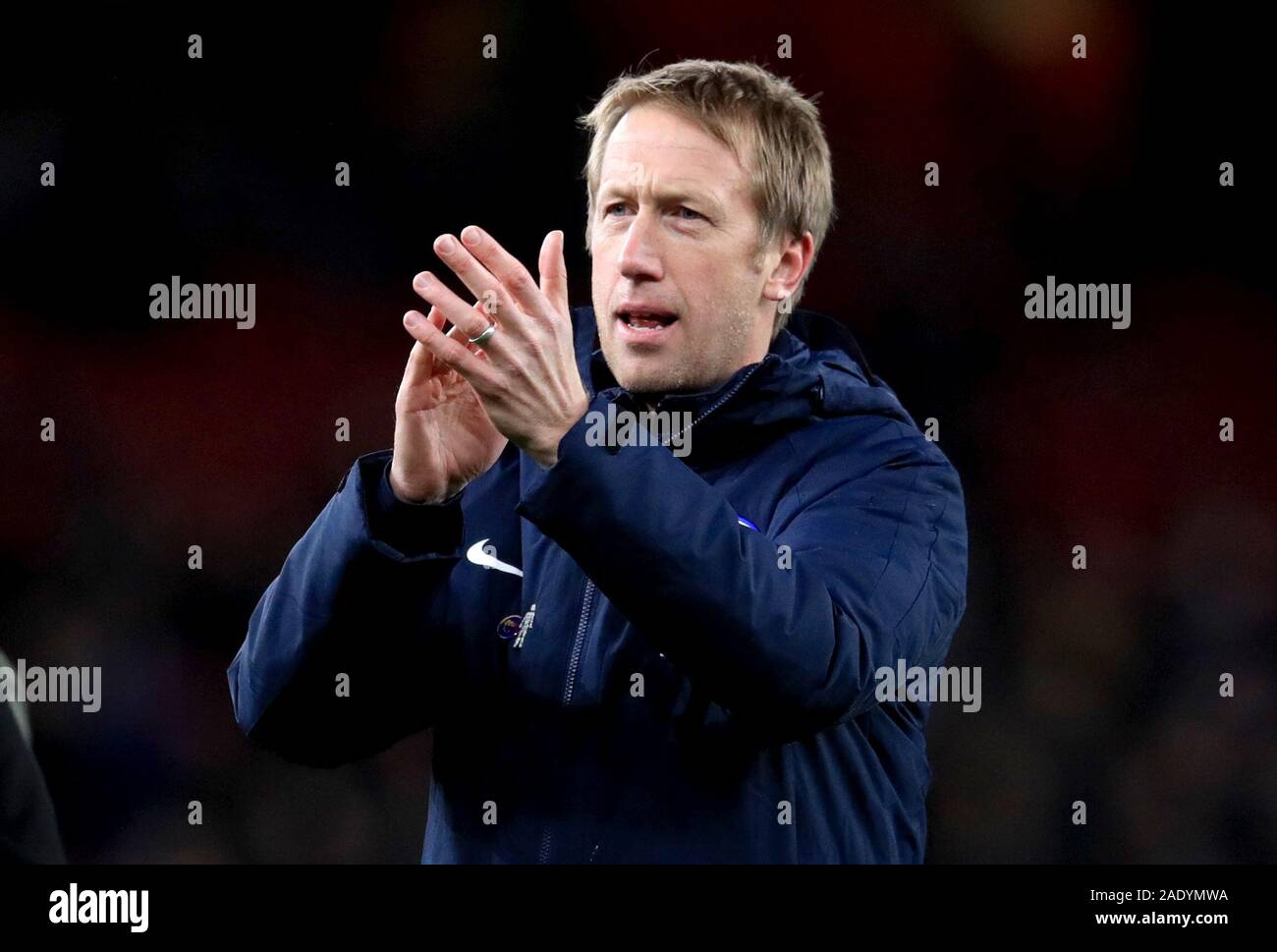 Brighton and Hove Albion manager Graham Potter applauds the fans at the end of the Premier League match at the Emirates Stadium, London. Stock Photo