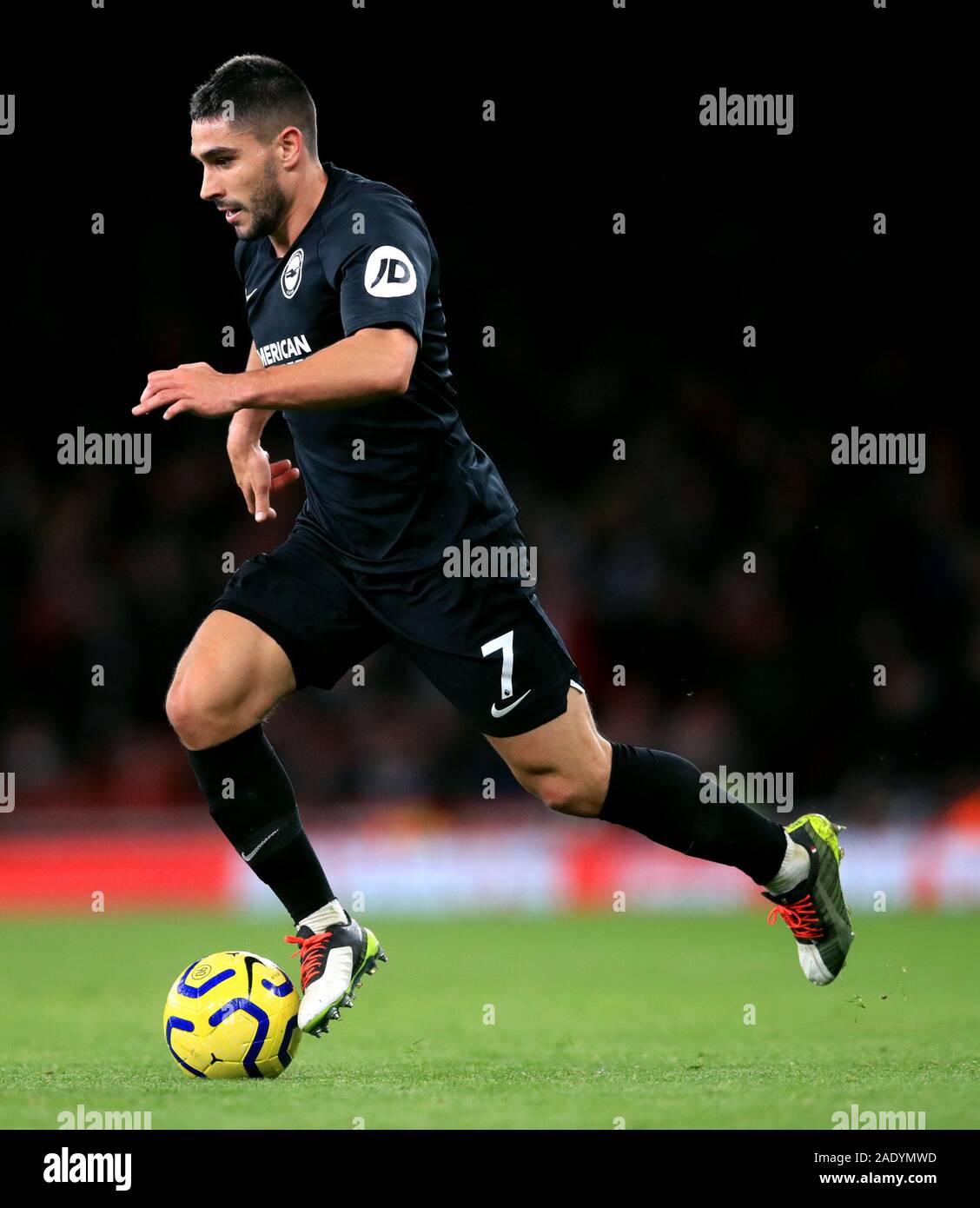 Brighton and Hove Albion's Neal Maupay in action during the Premier League match at the Emirates Stadium, London. Stock Photo